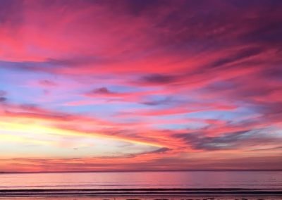 Kinney Shores sunset over the ocean