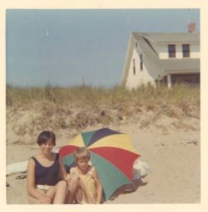 Jen with neighbours' nanny in front of the Seagull cottage